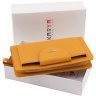 Кожаный женский кошелек-клатч оранжевого цвета с кистевым ремешком Karya 67503 - 11