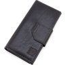 Крупный кожаный кошелек черного цвета с хлястиком на магните Grande Pelle 67810 - 1