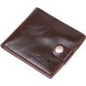Кожаное мужское портмоне коричневого цвета с хлястиком на кнопке Shvigel (2416443) - 1