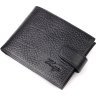 Вместительное мужское портмоне черного цвета с хлястиком на кнопке KARYA (2421087) - 1