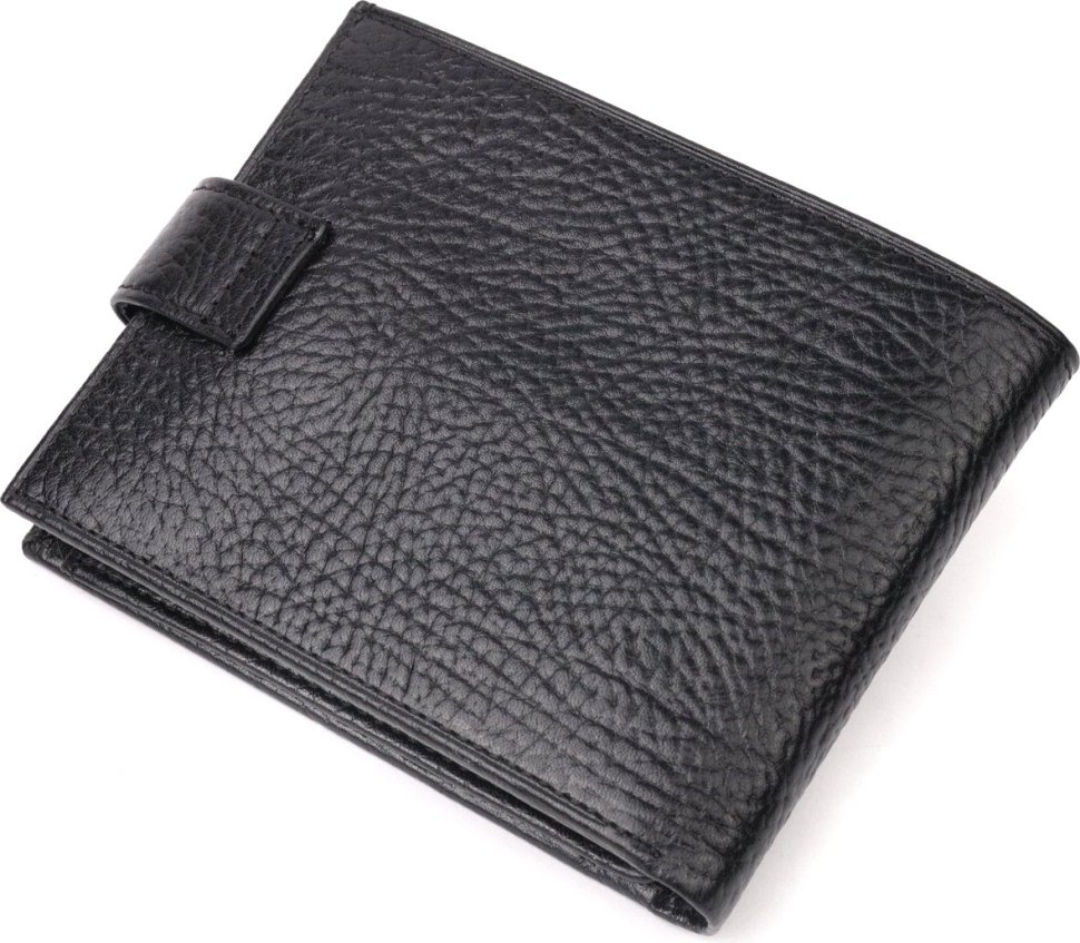 Вместительное мужское портмоне черного цвета с хлястиком на кнопке KARYA (2421087)