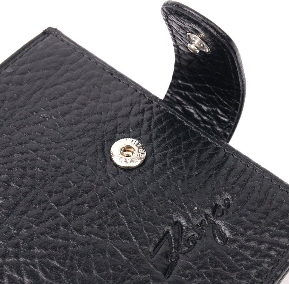 Вместительное мужское портмоне черного цвета с хлястиком на кнопке KARYA (2421087)