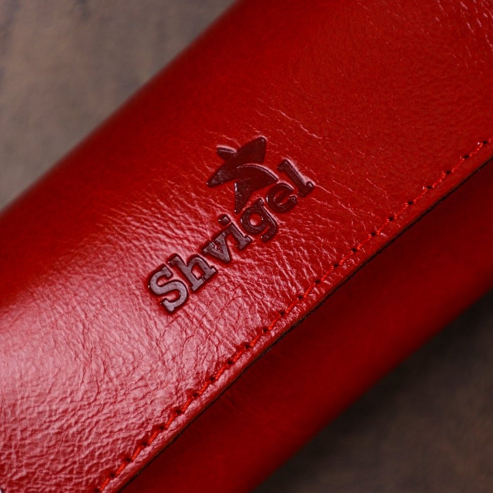 Стильная женская кожаная ключница красного цвета на кнопках Shvigel (2416530)