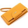 Шкіряний жіночий гаманець-клатч оранжевого кольору з кистьовим ремінцем Karya 67503 - 3