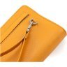 Шкіряний жіночий гаманець-клатч оранжевого кольору з кистьовим ремінцем Karya 67503 - 5