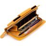 Шкіряний жіночий гаманець-клатч оранжевого кольору з кистьовим ремінцем Karya 67503 - 8