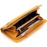 Кожаный женский кошелек-клатч оранжевого цвета с кистевым ремешком Karya 67503 - 9