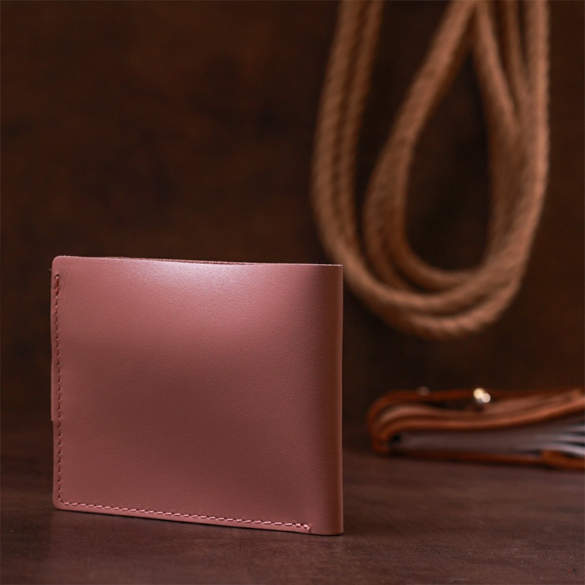 Горизонтальное женское портмоне из натуральной кожи розового цвета Shvigel (2416446)