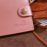 Горизонтальное женское портмоне из натуральной кожи розового цвета Shvigel (2416446) - 8
