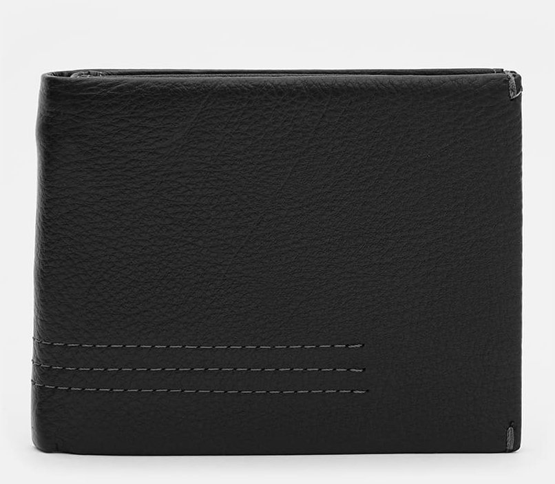 Чоловічий шкіряний портмоне чорного кольору із затискачем для купюр Ricco Grande 65007