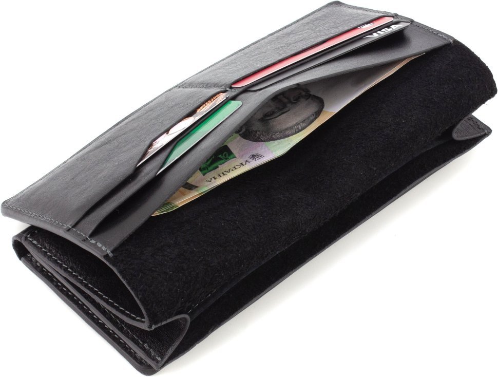 Великий шкіряний гаманець чорного кольору з хлястиком на магніті Grande Pelle 67810