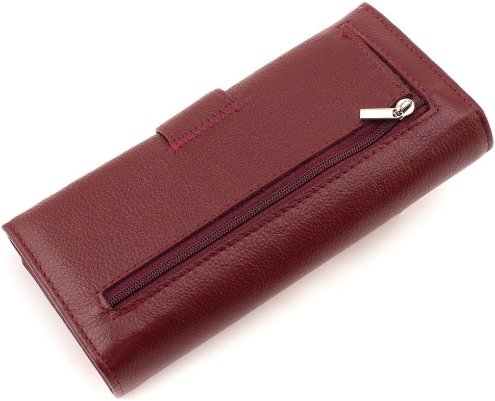 Шкіряний жіночий гаманець бордового кольору з хлястиком на кнопці ST Leather 1767411