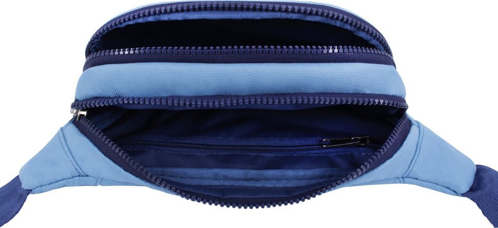 Жіноча компактна сумка-бананка із текстилю блакитного кольору Bagland (53813)