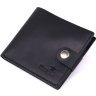 Шкіряний чоловічий гаманець горизонтального типу в чорному кольорі з фіксацією на кнопку Shvigel (2416432) - 1