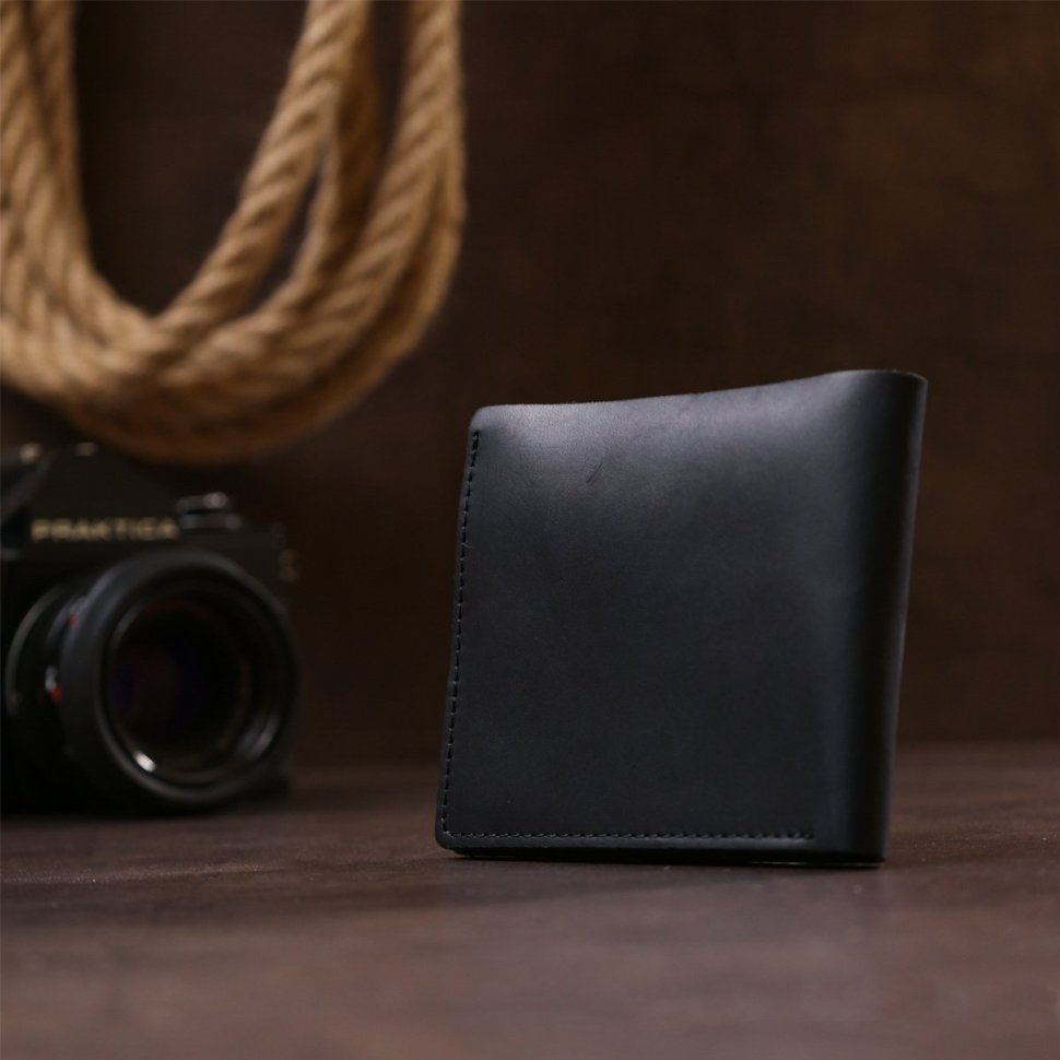 Шкіряний чоловічий гаманець горизонтального типу в чорному кольорі з фіксацією на кнопку Shvigel (2416432)
