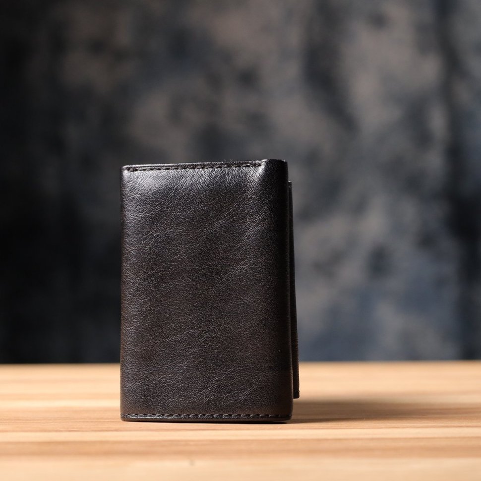 Небольшой женский кошелек из гладкой кожи с монетницей на кнопке Tony Perotti черного цвета 108516 modnotak фото №10