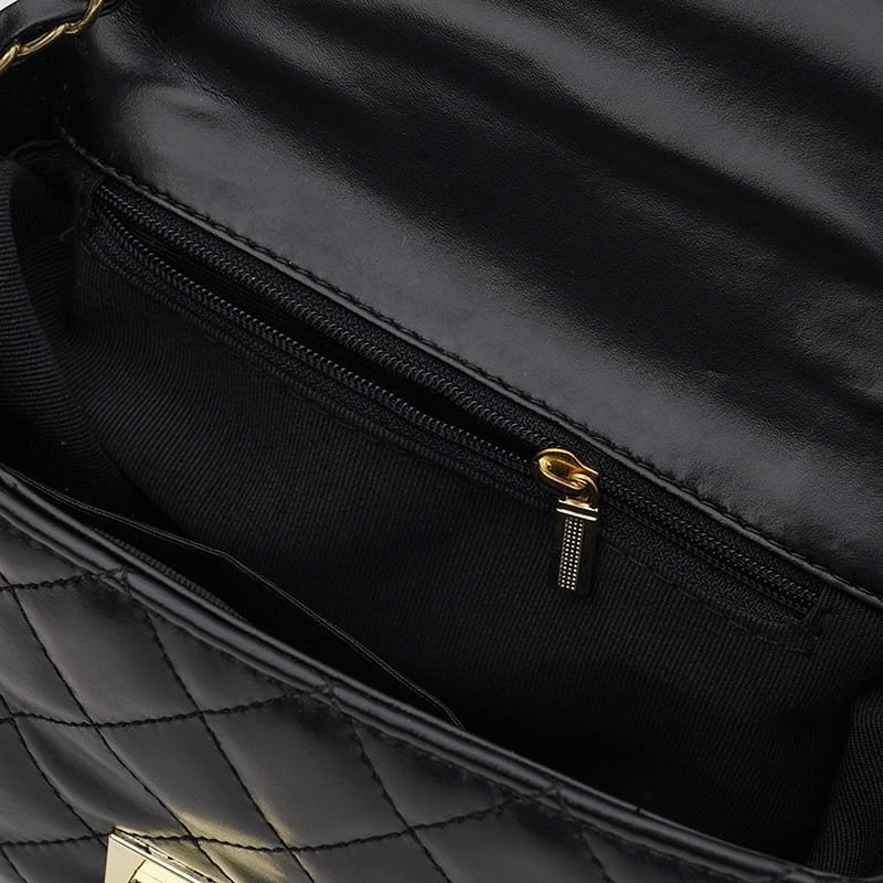 Женская кожаная стеганая сумка-кроссбоди черного цвета Keizer (56018)