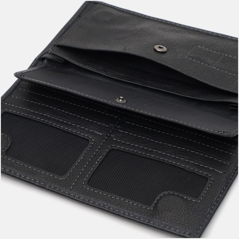 Длинный мужской кожаный купюрник черного цвета на магнитах Ricco Grande 65420