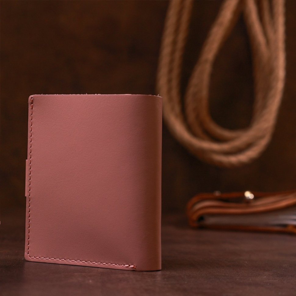 Жіночий рожевий гаманець із гладкої шкіри з хлястиком на кнопці Shvigel (2416488)