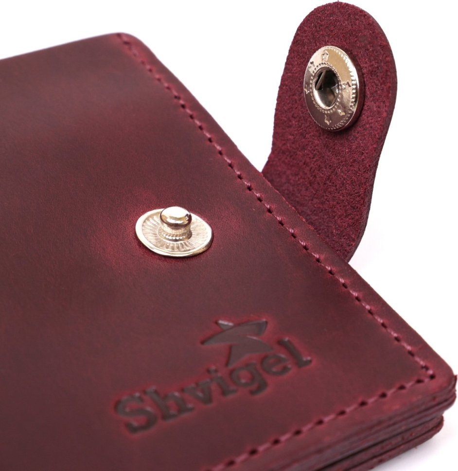 Кожаное мужское портмоне марсалового цвета с хлястиком на кнопке Shvigel (2416436)