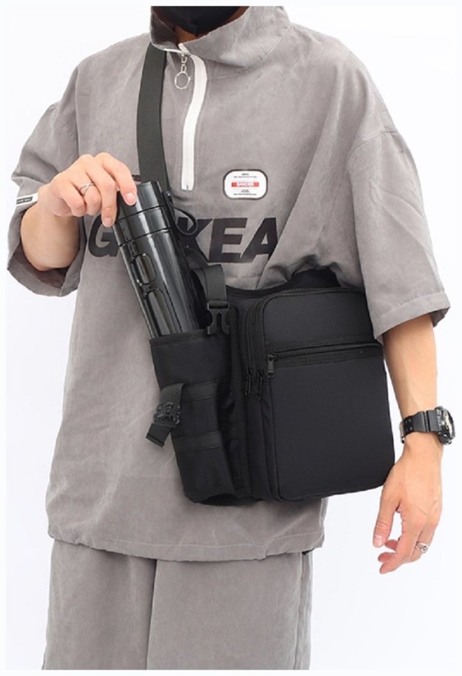 Мужская текстильная сумка-мессенджер черного цвета через плечо Confident 77445