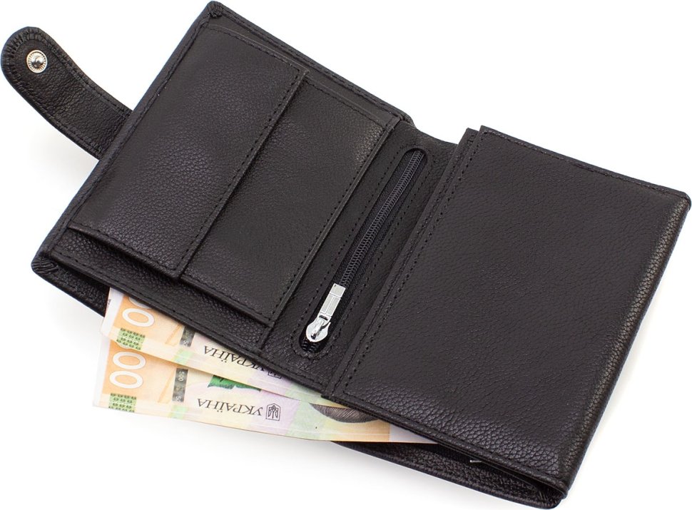 Чоловічий вертикальний гаманець середнього розміру із чорної шкіри Leather Collection (21534)