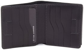 Чорне шкіряне чоловіче портмоне на магніті з написом З Україною в серці - Grande Pelle (13137)