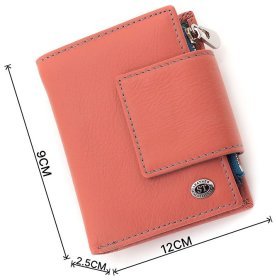 Шкіряний жіночий гаманець рожевого кольору з хлястиком на магніті ST Leather 1767248