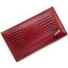 Жіночий шкіряний лакований гаманець Leather Collection 97749 червоного кольору modnotak фото - 3