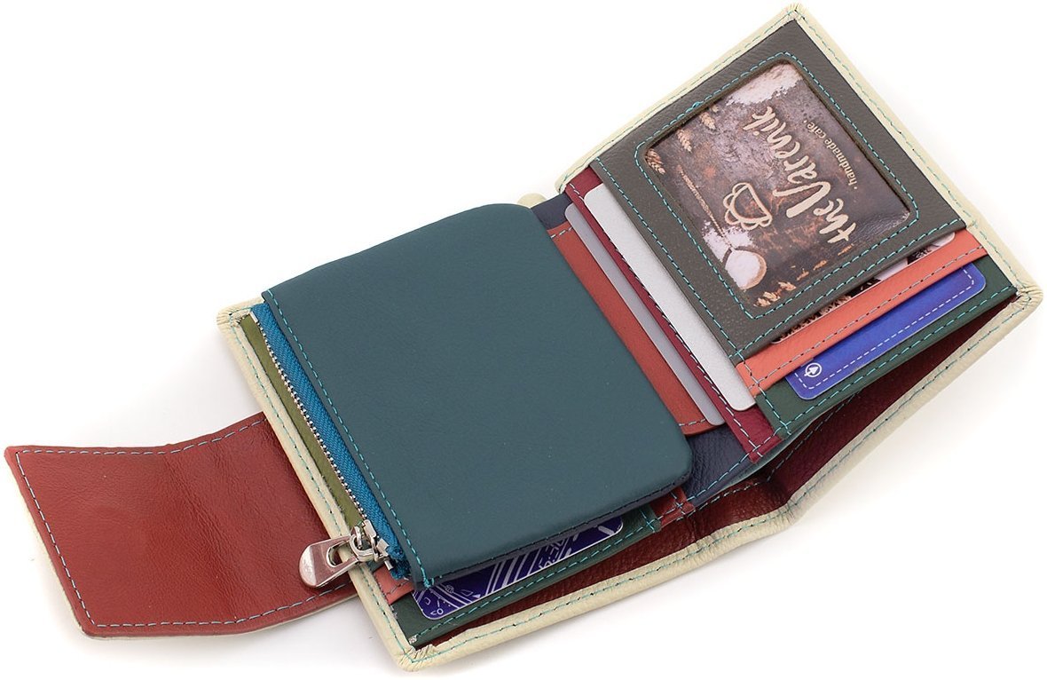 Шкіряний жіночий гаманець молочного кольору з хлястиком на магніті ST Leather 1767250