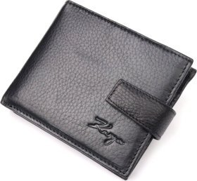 Чорне чоловіче портмоне з натуральної шкіри з крупно-вираженою фактурою на кнопці KARYA (2421037)
