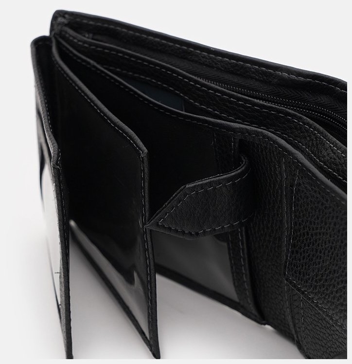 Шкіряне чоловіче портмоне чорного кольору з блоком для карток та документів Ricco Grande 71553