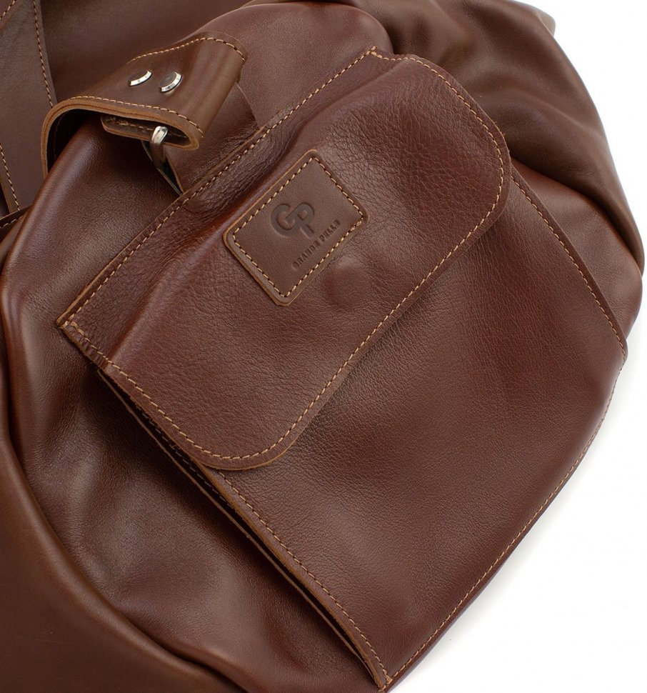 Якісна дорожня сумка з натуральної шкіри кольору коньяк Grande Pelle (15489)