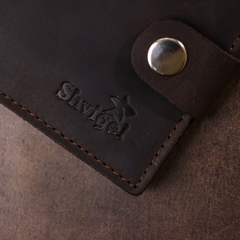 Шкіряне вінтажне портмоне для чоловіків у темно-коричневому кольорі Shvigel (2416454)