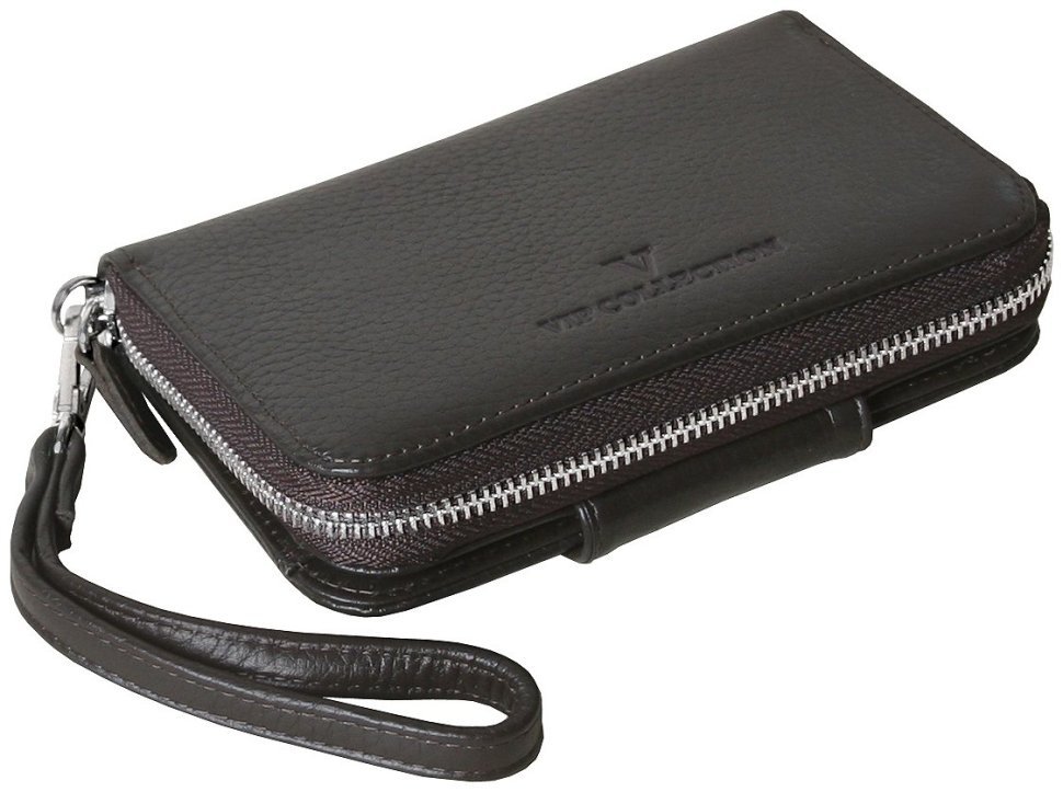 Вместительный кошелек из фактурной кожи с дополнительным блоком на кнопке и с ремешком на запястье Vip Collection 102358 (коричневого цвета) фото №1 Вместительный кошелек из фактурной кожи с дополнительным блоком на кнопке и с ремешком на запястье Vip Collection 102358 (коричневого цвета) modnotak фото №1