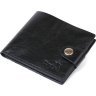 Черное кожаное мужское портмоне с фиксацией на хлястик и кнопку Shvigel (2416460) - 1