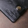 Чорне шкіряне чоловіче портмоне з фіксацією на хлястик та кнопку Shvigel (2416460) - 8