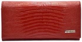 Яскравий гаманець червоного кольору зі шкіри з лазерною фактурою для жінок Desisan 107860