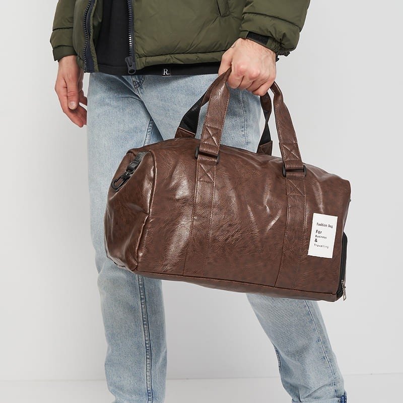 Мужская дорожная сумка коричневого цвета из кожзама с ручками Monsen (21404)