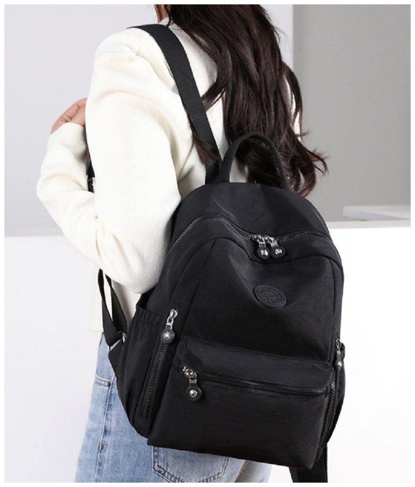 Жіночий текстильний міський рюкзак чорного кольору Confident 77567