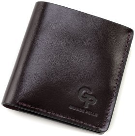 Маленькое женское портмоне на магнитах Grande Pelle 82768 бордового цвета