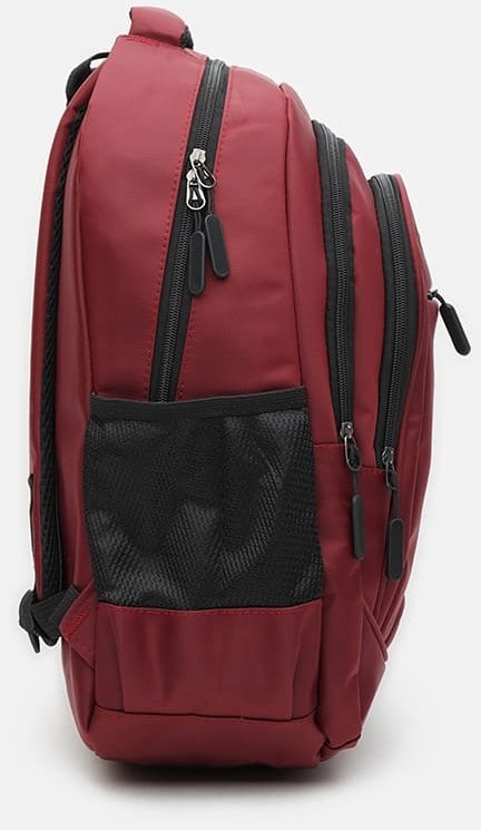 Недорогий жіночий рюкзак в червоному кольорі з текстилю Monsen (21469)