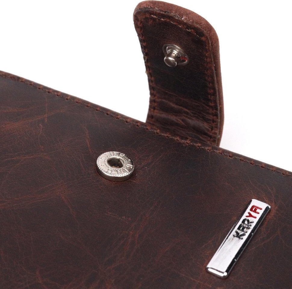 Темно-коричневое мужское портмоне из винтажной кожи с фиксацией на кнопку KARYA (2421372)