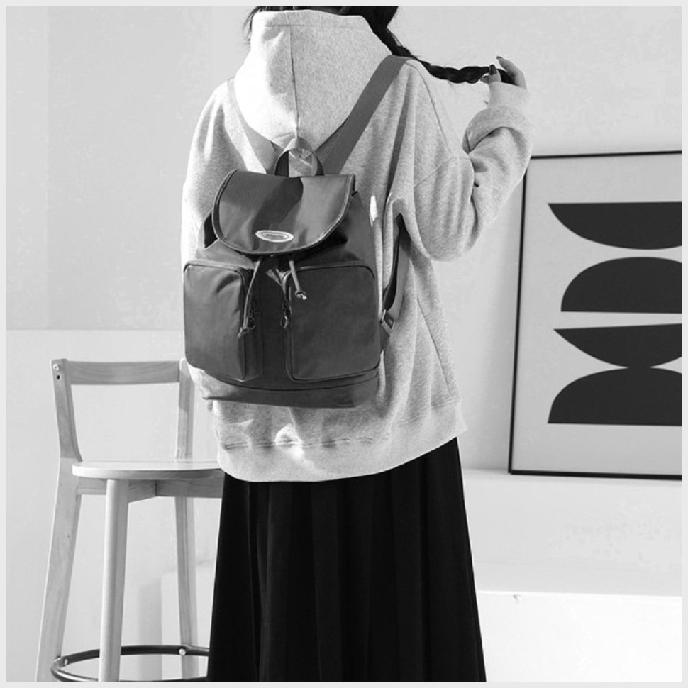 Чорний жіночий рюкзак із міцного текстилю з клапаном Confident 77571