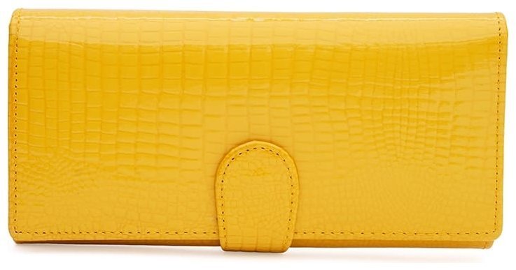 Большой яркий женский кошелек из кожзама с хлястиком на кнопке Monsen 109071 желтого цвета modnotak фото №1