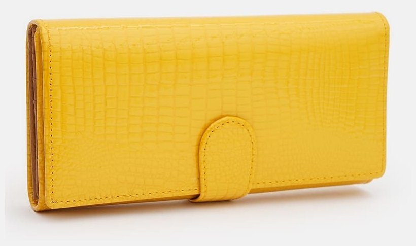 Большой яркий женский кошелек из кожзама с хлястиком на кнопке Monsen 109071 желтого цвета modnotak фото №2