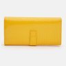 Большой яркий женский кошелек из кожзама с хлястиком на кнопке Monsen 109071 желтого цвета modnotak фото - 3