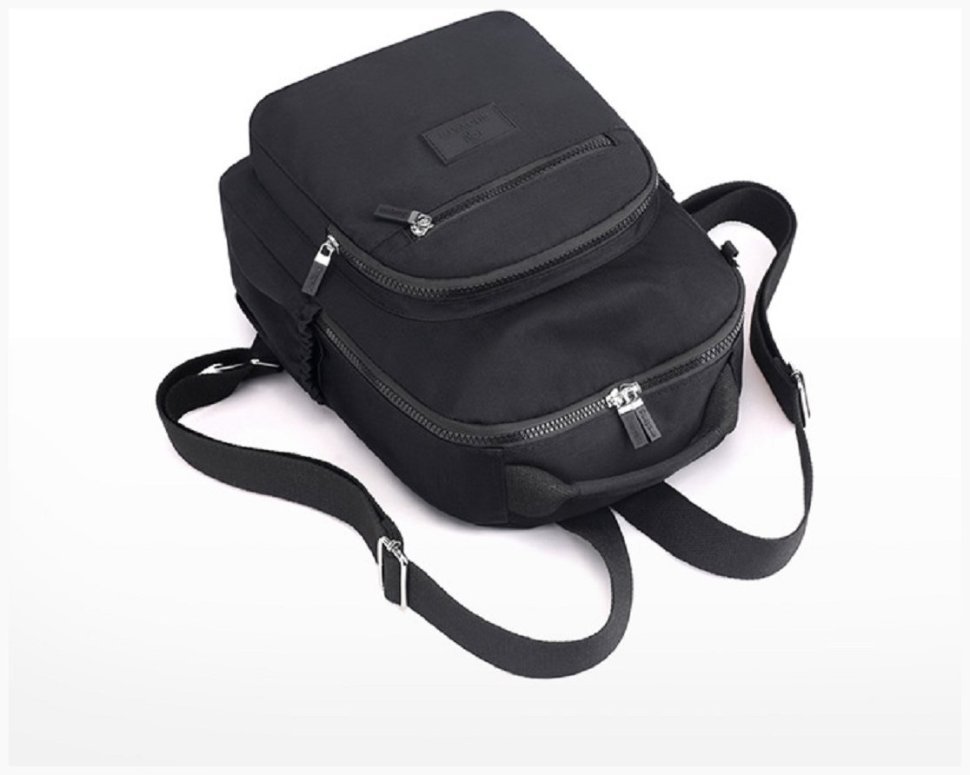 Жіночий рюкзак із міцного текстилю чорного кольору на змійці Confident 77572
