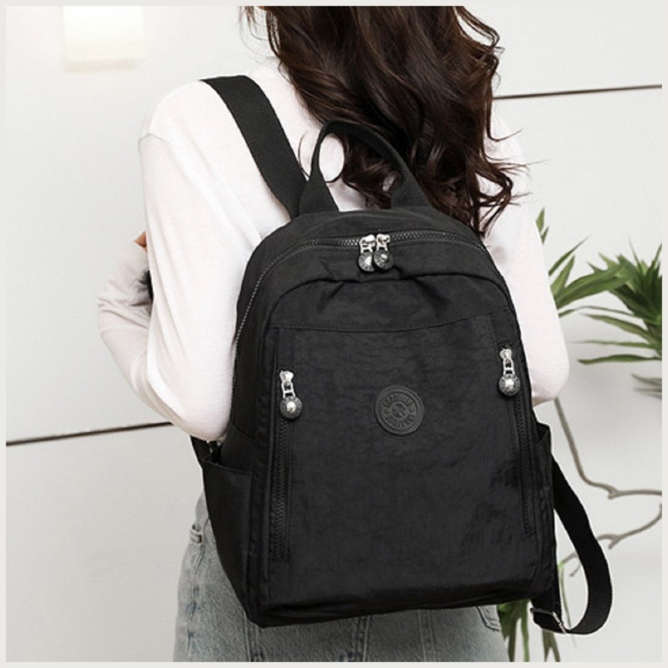Великий жіночий текстильний рюкзак чорного кольору Confident 77573