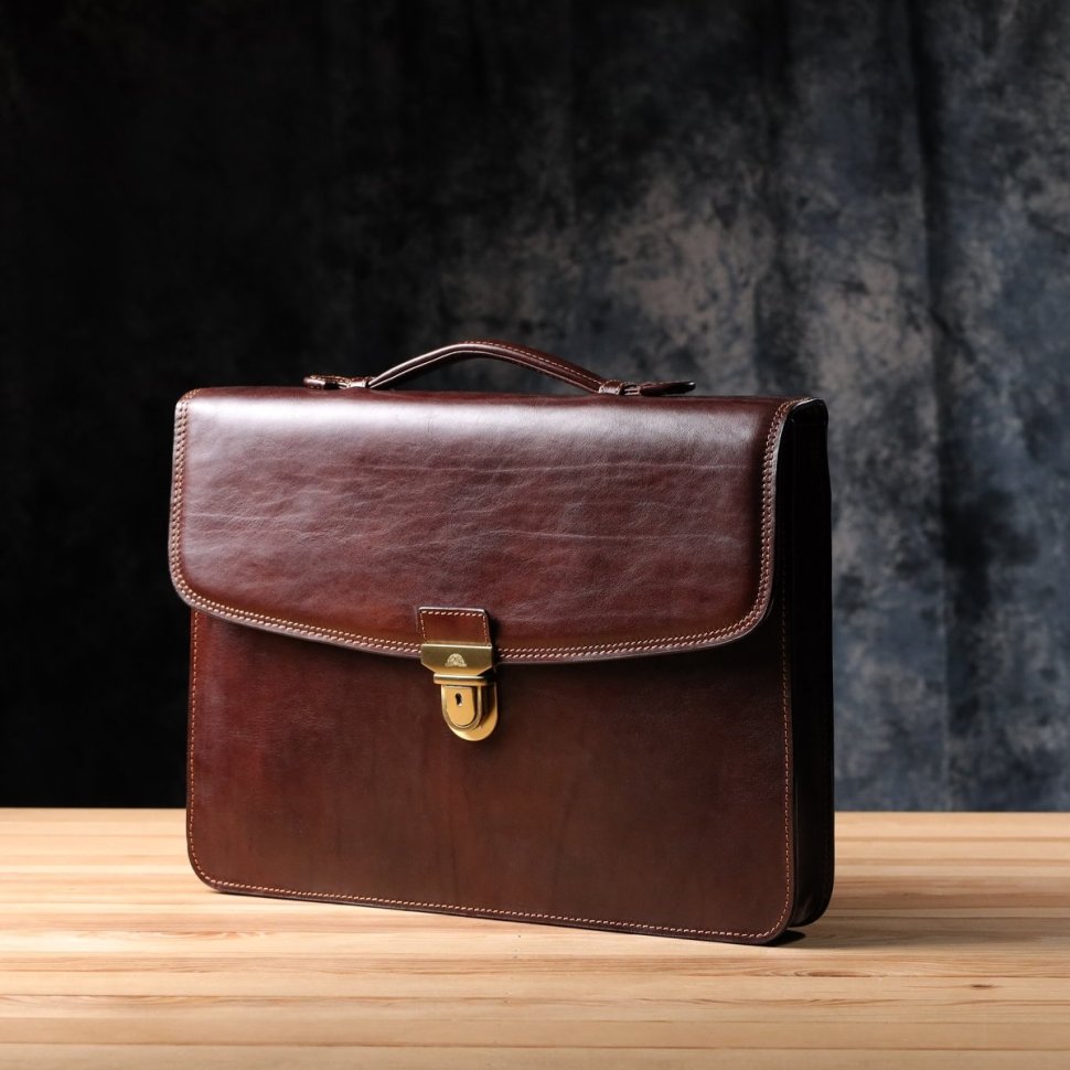 Деловой мужской портфель из гладкой кожи с металлической защелкой и ручкой для носки Tony Perotti коричневого цвета 108373 modnotak фото №9